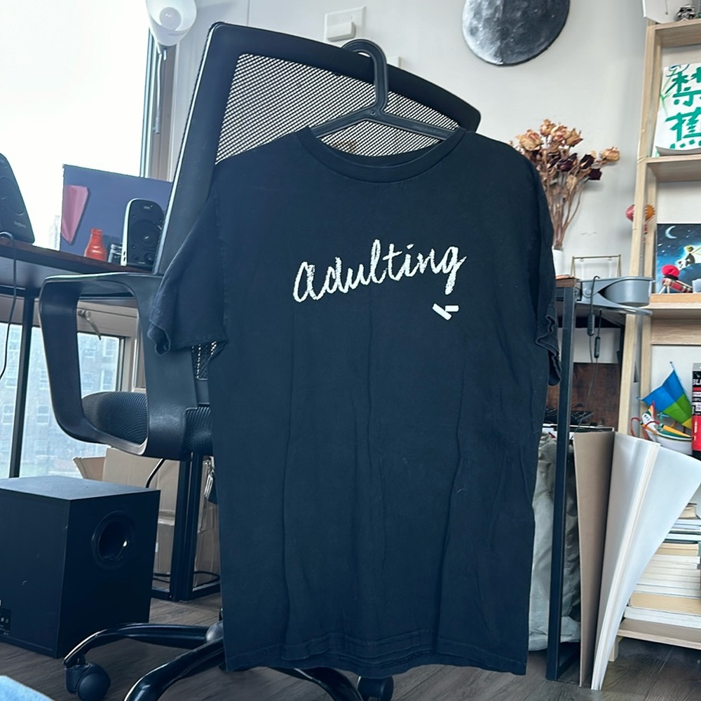 Black T-shirt; no tag